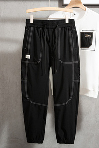 714A-K88112P55/2025春季新品男士休闲哈伦小脚裤黑色纯色裤子潮图片