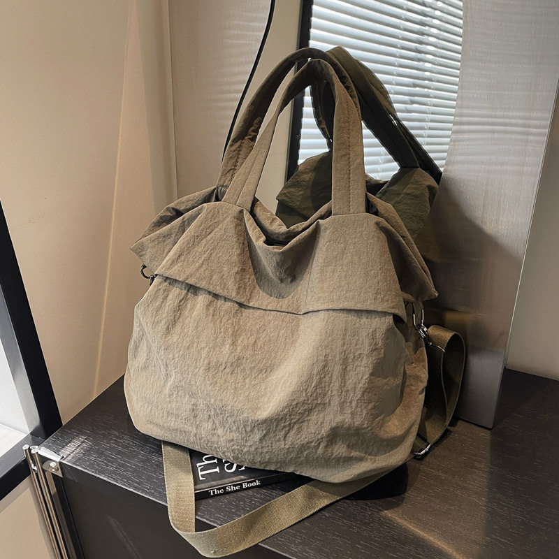 原创韩版尼龙布水桶包女手提百搭大包包网红同款洋气单肩斜挎包