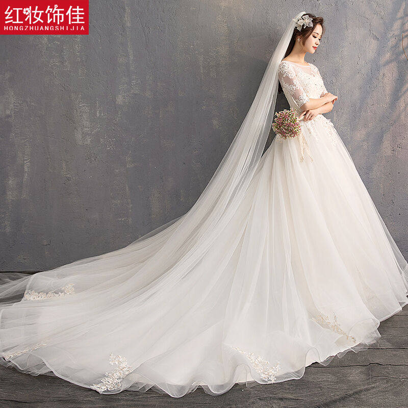 红妆饰佳婚纱礼服2021新款公主新娘拖尾长袖轻婚纱森系显瘦浅香槟属于什么档次？