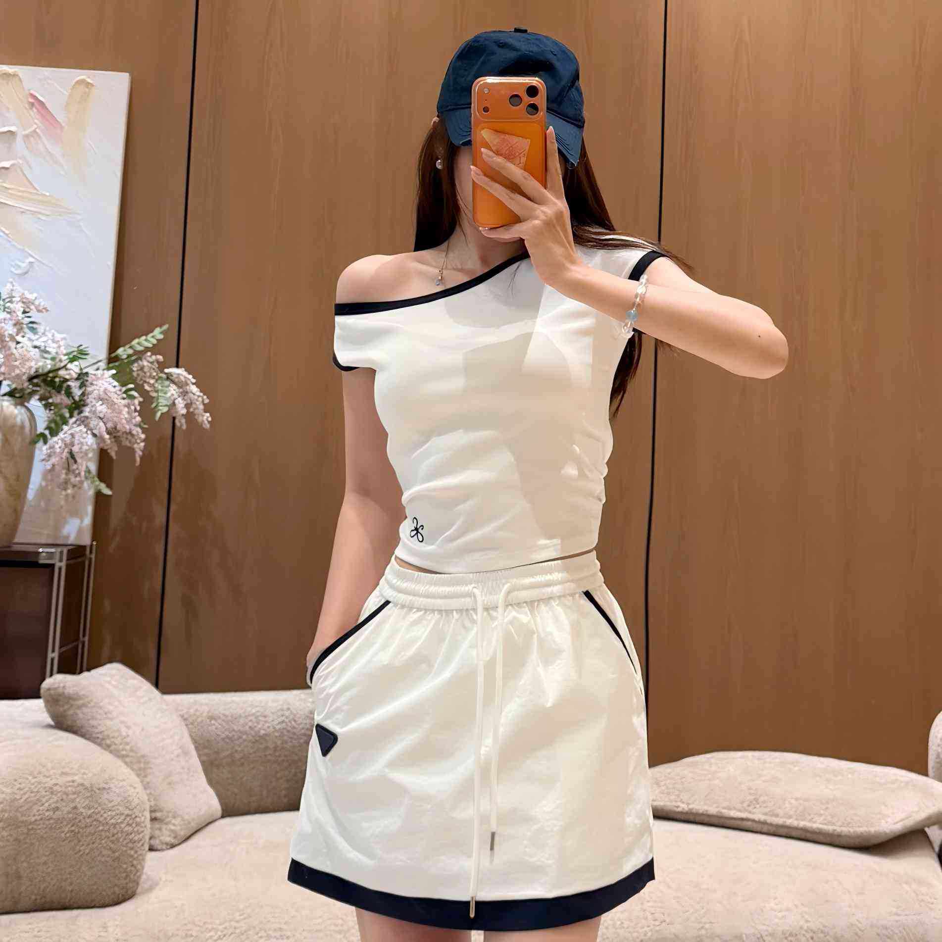 蓝白撞色拼接短裙夏季性感辣妹装半身裙搭配内存南油女运动休闲裙