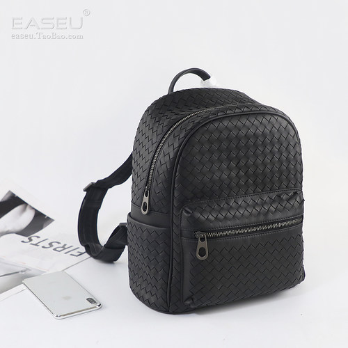 进口头层胎牛皮编织休闲时尚背包