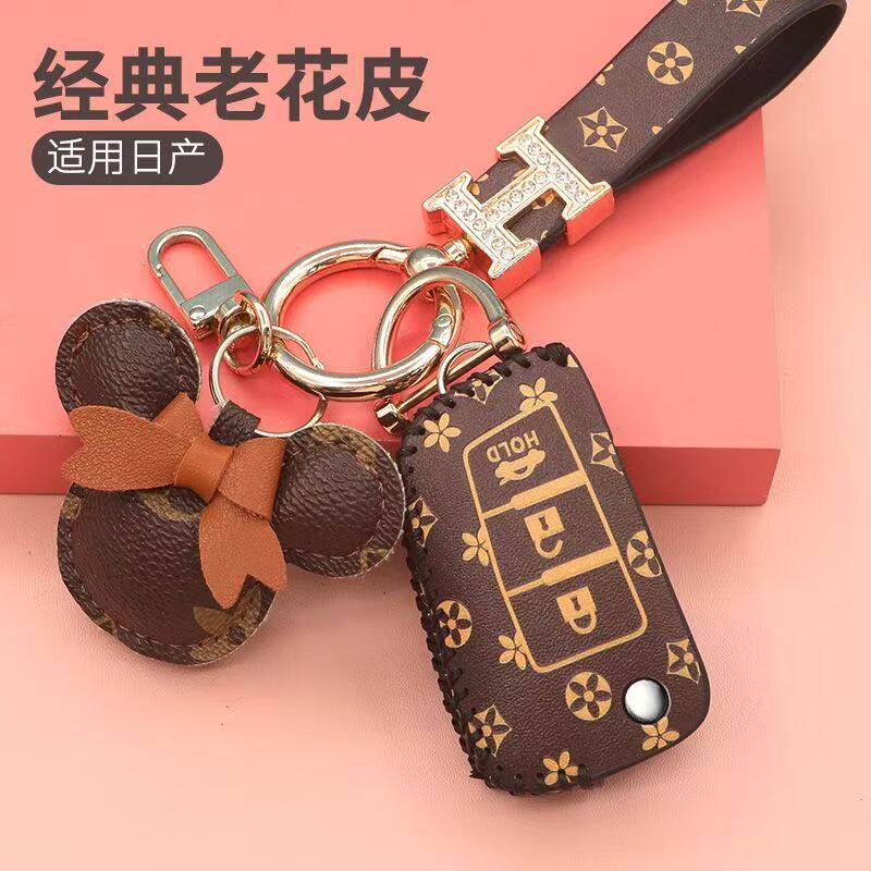 适用于日产轩逸钥匙套经典21款骐达车逍客女真皮劲客蓝鸟包奇骏扣