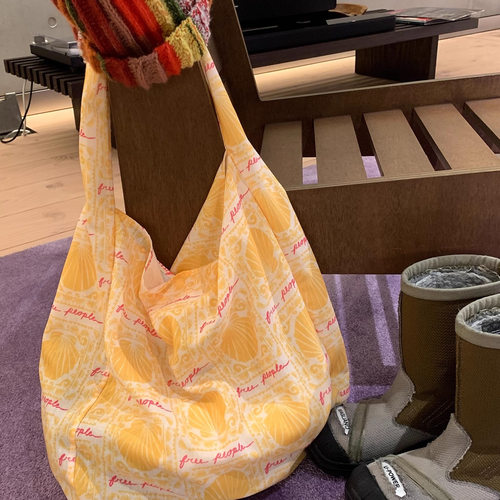 韩系ins风招财蜜蜡黄帆布包休闲慵懒百搭大容量小清新旅行托特包