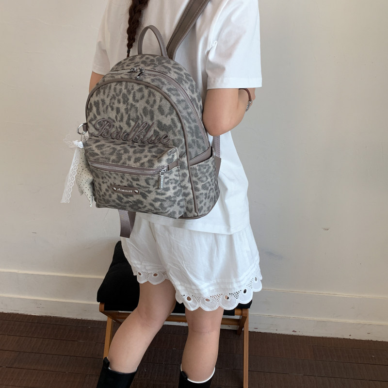 双肩包女士2026夏新款百搭灰色豹纹通勤学生背包大容量pu软皮质包