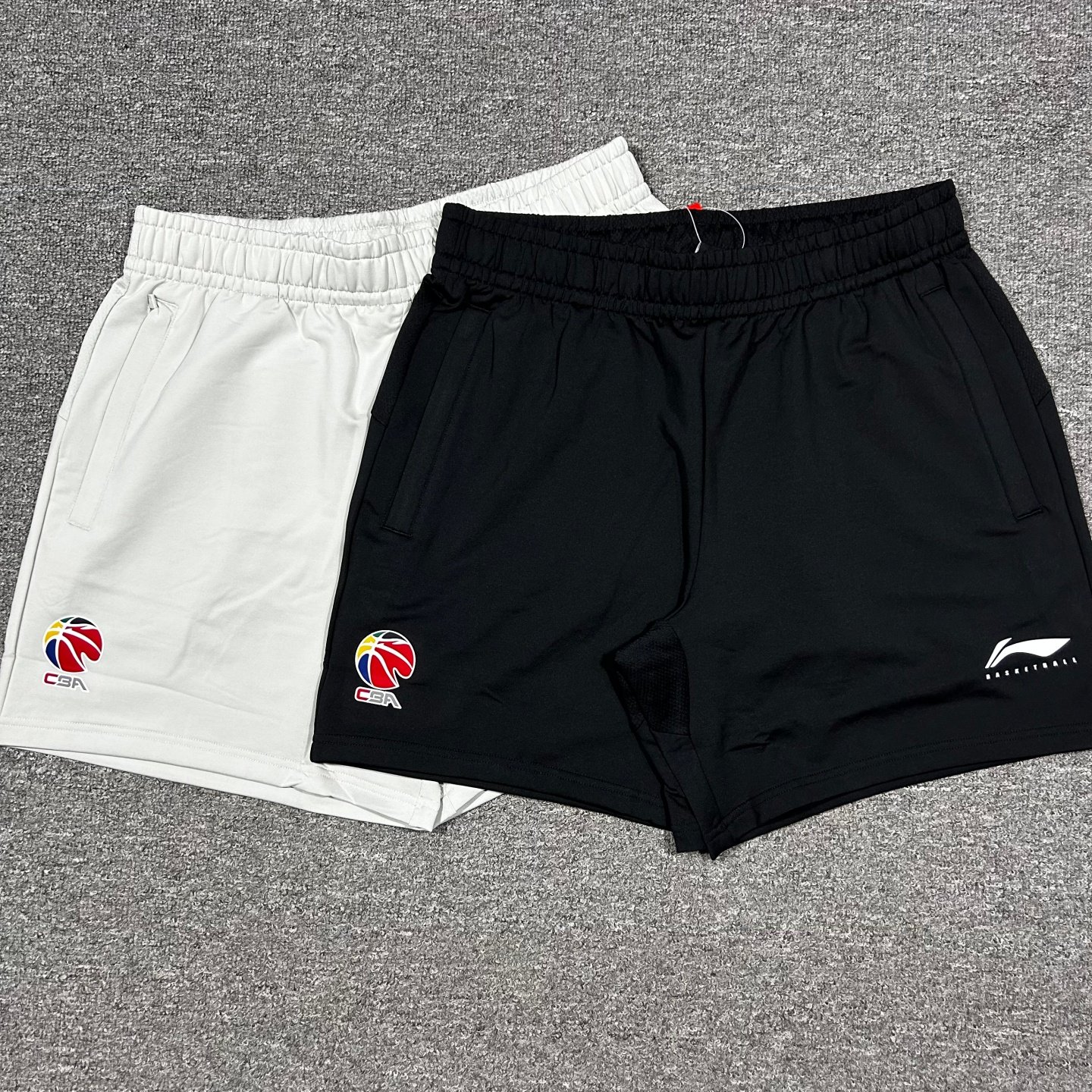李宁赞助CBA25-26赛季男子篮球运动短裤速干弹性四分裤AKSW351