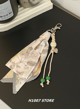 白色茶花丝巾编绳包挂男裤链女小众设计穿搭工装裤挂链钥匙扣新款