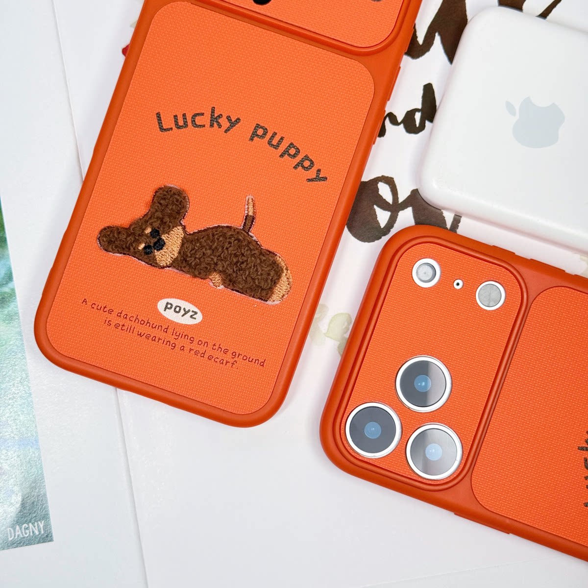 橙活力满满iphone 17promax毛绒趴趴狗苹果16pro