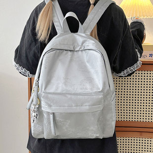 皮质软皮双肩包女小型通勤旅行防水背包2025新款时尚大学生书包潮