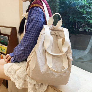 双肩包女旅游轻便高颜值运动旅行背包日系大学生简约纯色手提书包