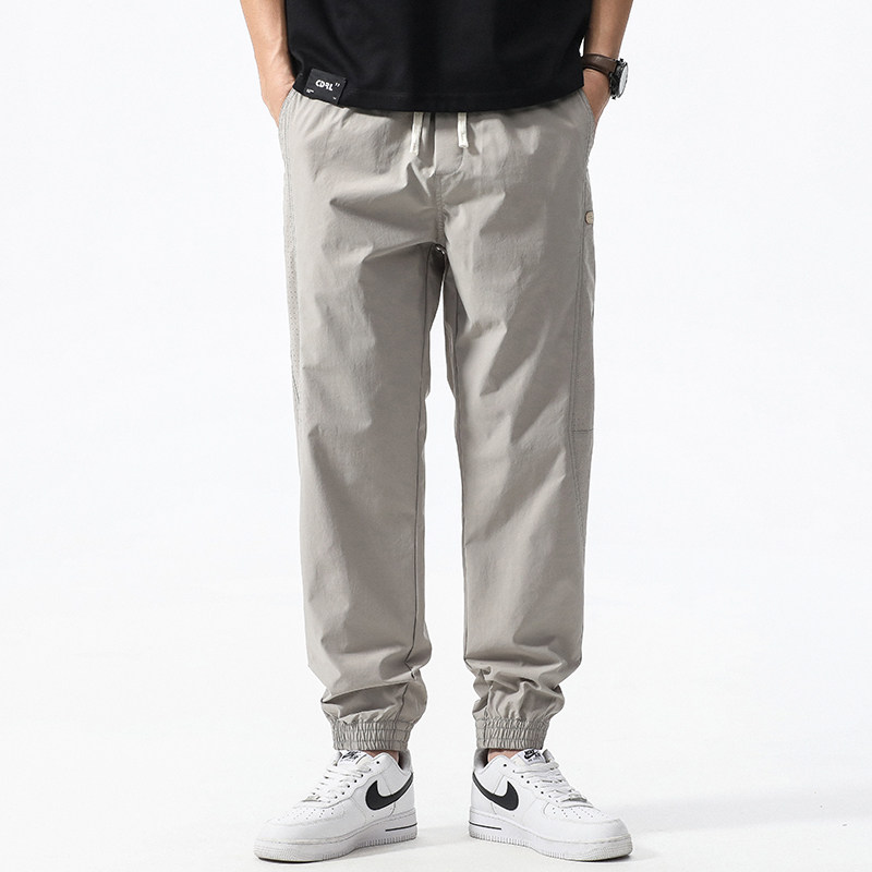 日系春夏薄款工装休闲裤男款潮牌拼接宽松束脚透气运动哈伦长裤子