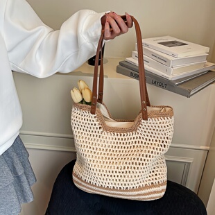 2026年新款时尚夏季海边度假风镂空手工草编包女大容量编织包包