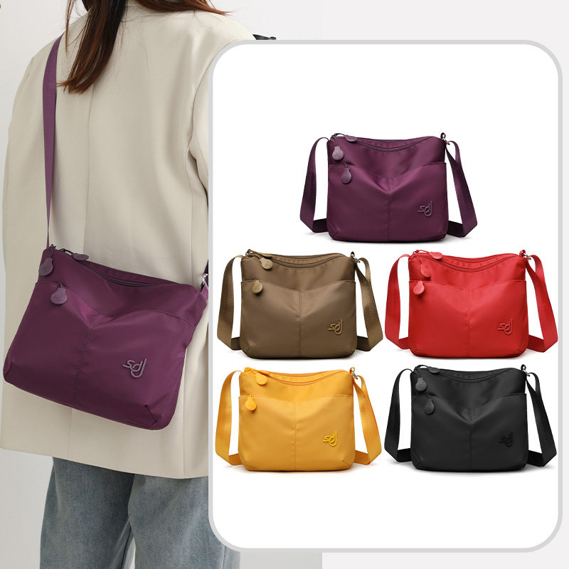牛津布斜挎包小包包女2026新款多层简约轻便尼龙单肩包时尚妈咪包