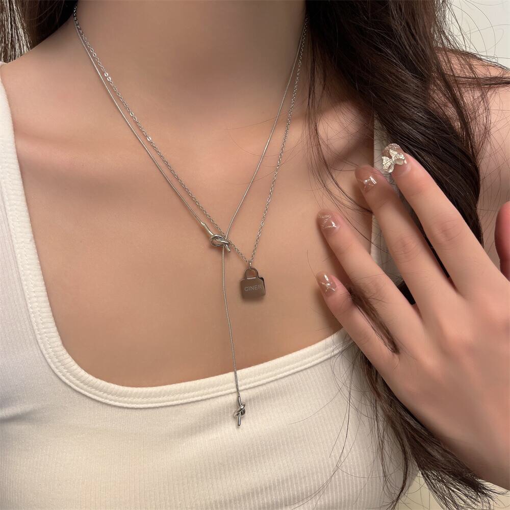 小众简约打结蛇骨项链 锁扣双层叠戴毛衣链长款毛衣链钛钢保色