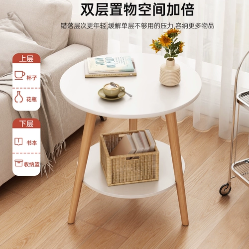 Кофейный столик маленький круглый столик домохозяйство гостиная маленькая квартира диван рядом с несколькими спальнями прикроватны