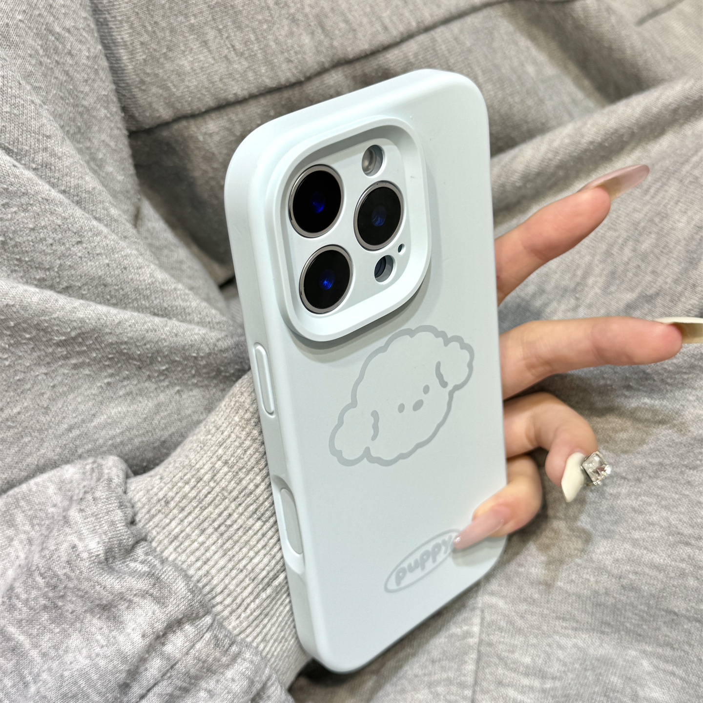 新天蓝色线条狗狗头像磨砂液态硅胶适用于iphone17promax苹果14手机壳15新款16pro女13可爱17pm全包防摔软壳