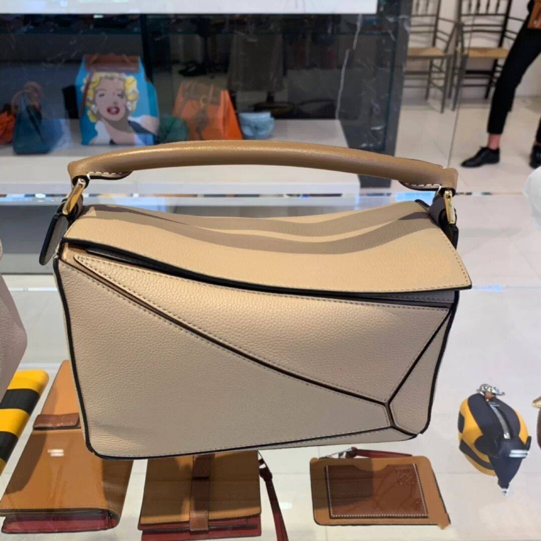 真皮女包2021新款潮波士顿包百搭puzzle几何包菱格斜挎手提枕头包