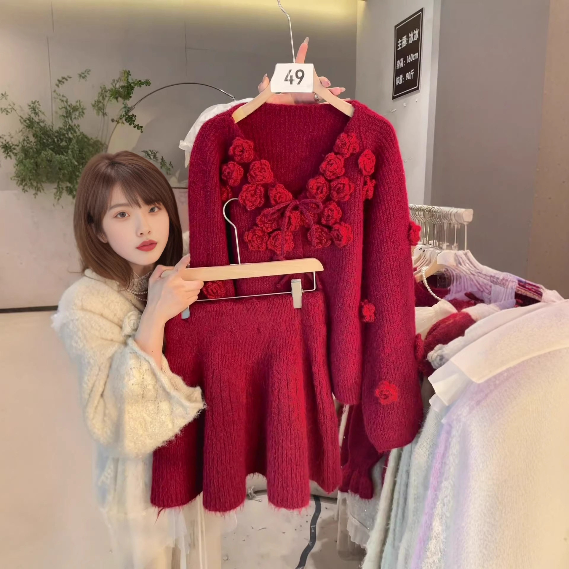 2026秋冬新款韩系手工花朵系带V领套头毛衣+高腰半身裙两件套装