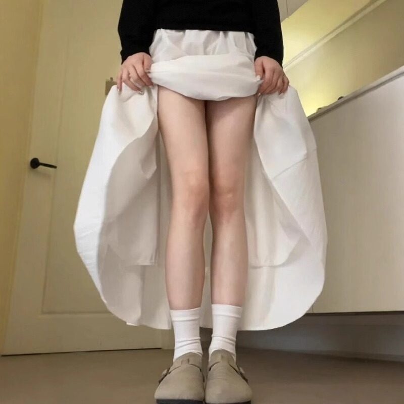 胖MM加大码白色半身裙女2026新款2-300斤高腰显瘦a字中长款花苞裙