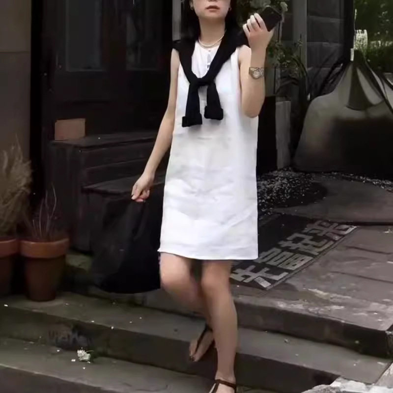 2025夏季气质亚麻纽扣白色无袖连衣裙女设计感宽松显瘦a字背心裙