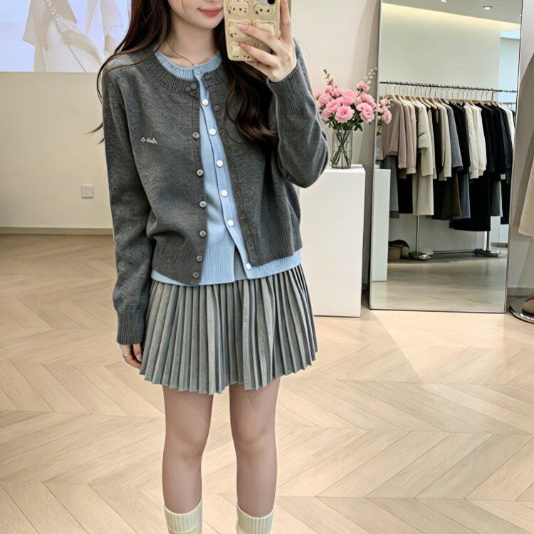 韩系穿搭一整套女2026超火减龄小个子假两件针织衫百褶裙两件套装