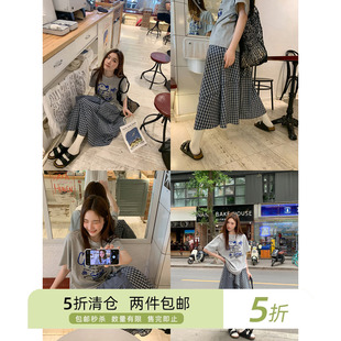 你好卡农 不规则格子拼接半身裙女夏季2025新款设计感下摆a字长裙