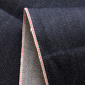 22oz深蓝色重磅赤耳丹宁牛仔面料denim外贸出口高档原色养牛布料