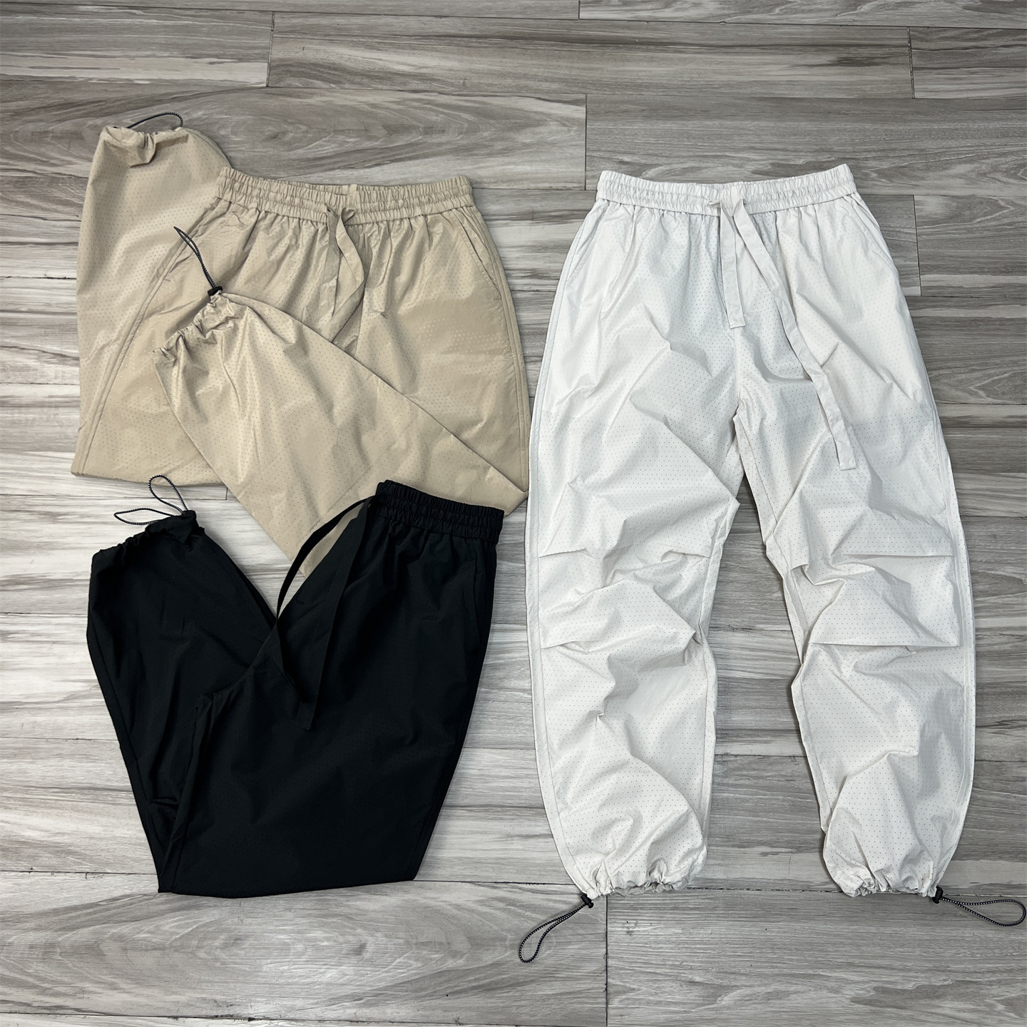 外贸欧单尾货激光冲孔凉感降温透气男女通用户外速干裤宽松伞兵裤