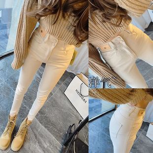 小众气质杏色高腰牛仔裤女2025年秋季时尚毛边排扣米色九分小脚裤