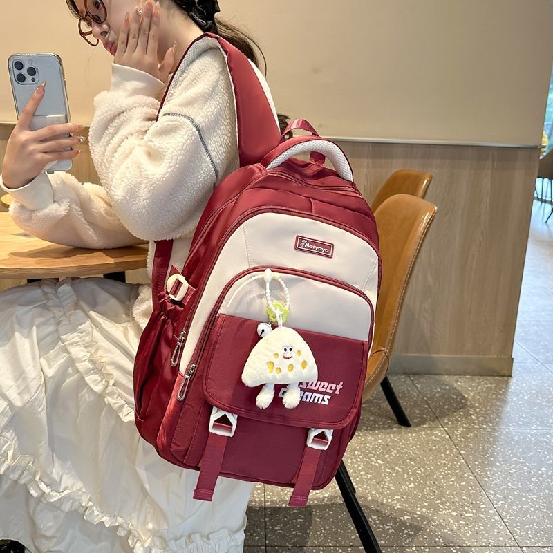 初高中生新款大容量护脊轻便防泼水双肩包休闲百搭包学生通勤背包