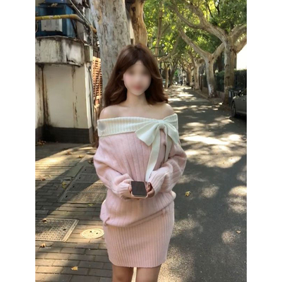 粉色露肩一字领包臀毛衣裙