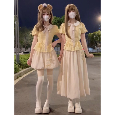 蝴蝶结黄色上衣+半身裙