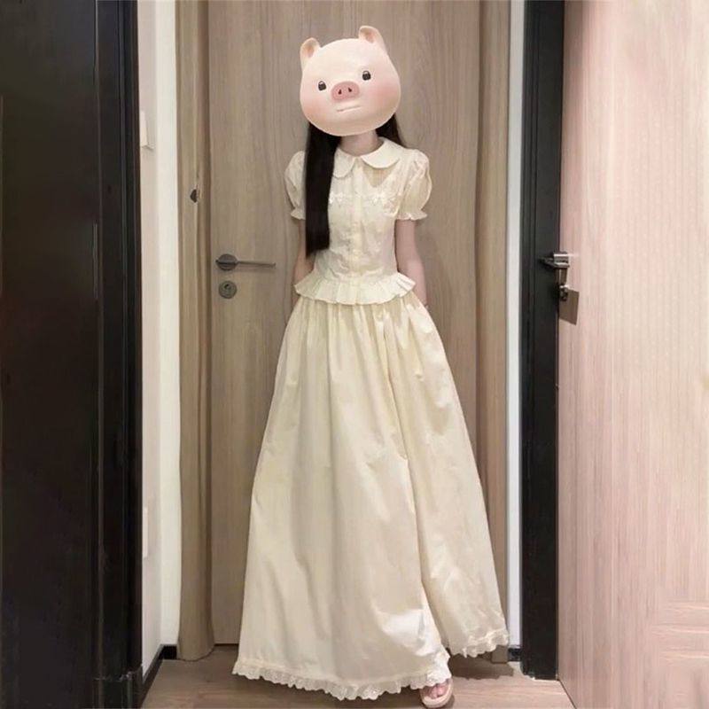 娃娃领下摆上衣+高腰半身长裙