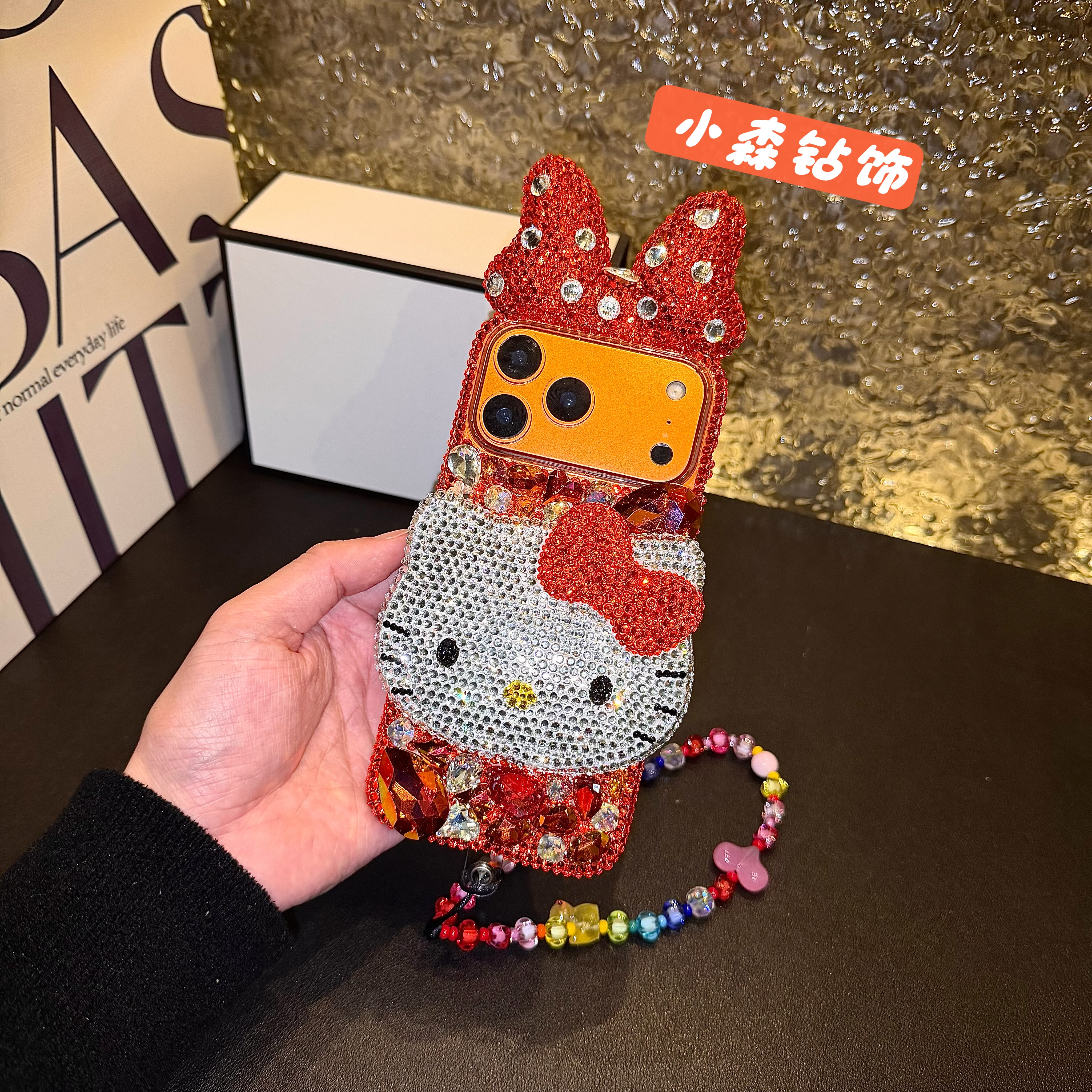懒懒同款17promax手机壳Hello Kitty橙色满钻16pro手机壳15蝴蝶结