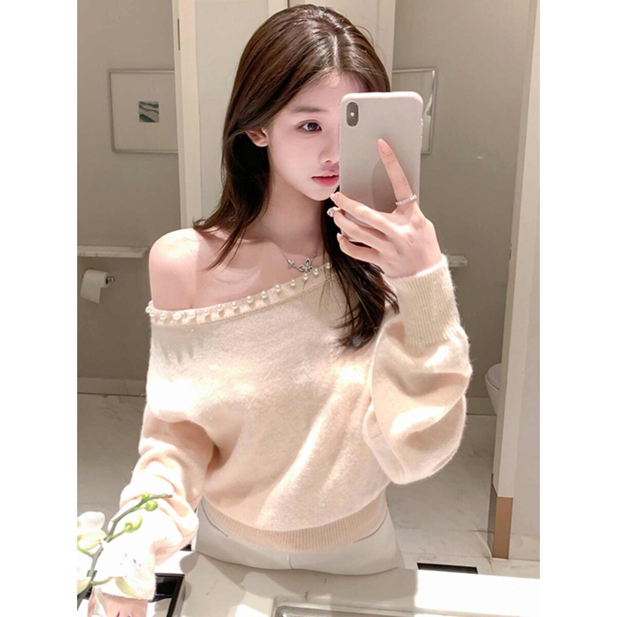 粉色斜肩针织衫女秋冬季纯欲风设计感超好看露肩打底衫上衣