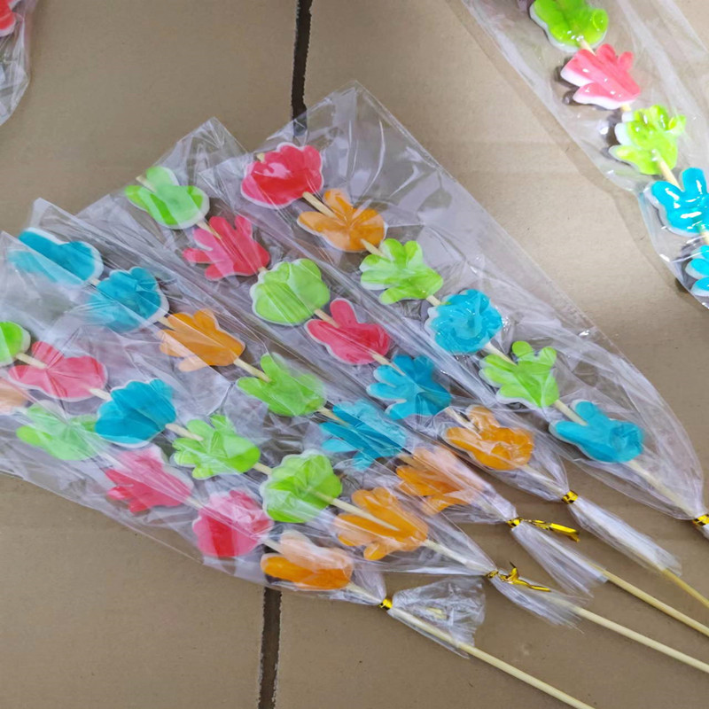 手指橡皮糖串串果汁软糖爆款儿童创意棒棒糖石头剪刀超市地摊夜市