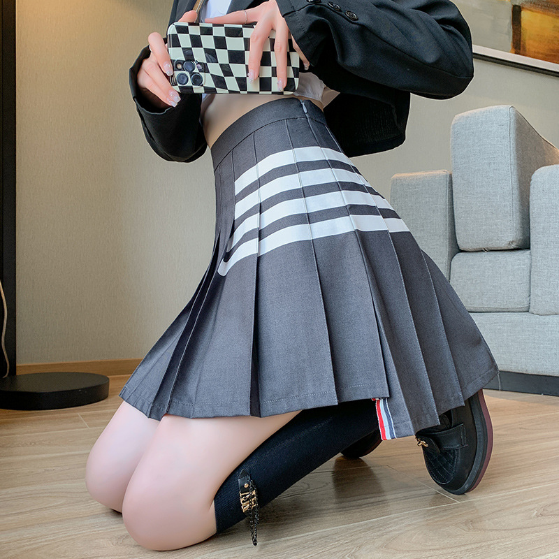 百褶裙女新款高腰休闲风同款显瘦秋冬不规则a字半身网球运动短裙