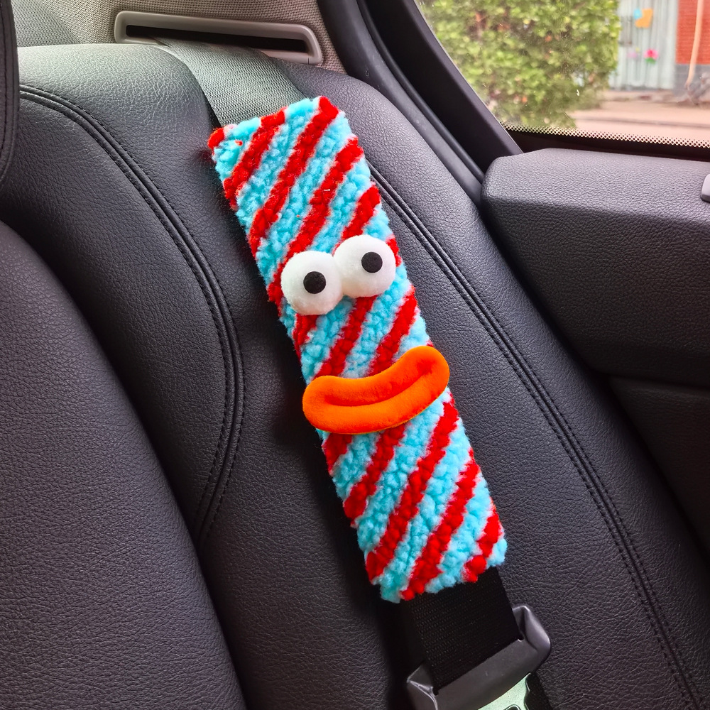 小怪兽汽车安全带护肩套车载保险带香肠嘴大车内装饰用品可爱眼睛