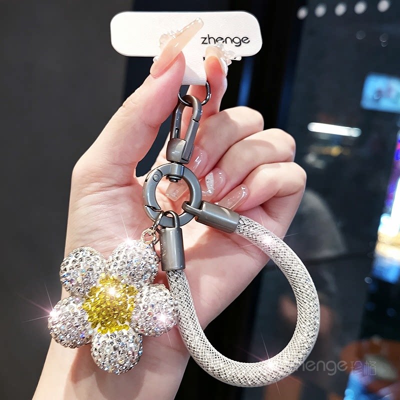 双域高级感满钻小花指环手机挂绳ins超好看小众精致女户外便携旅游出行逛街包包钥匙挂件拇指小吊绳通用新款