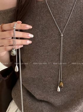 虎眼石水滴抽拉项链女2025新款爆款轻奢小众设计感长款毛衣链配饰