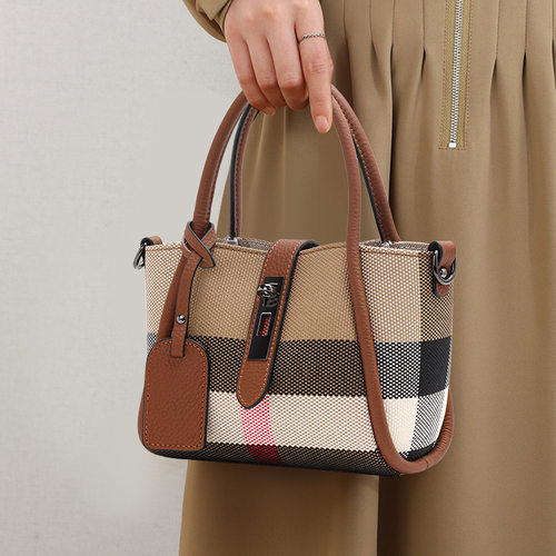 千典时尚真皮水桶包潮2025新款格子格纹包牛皮女包休闲手提