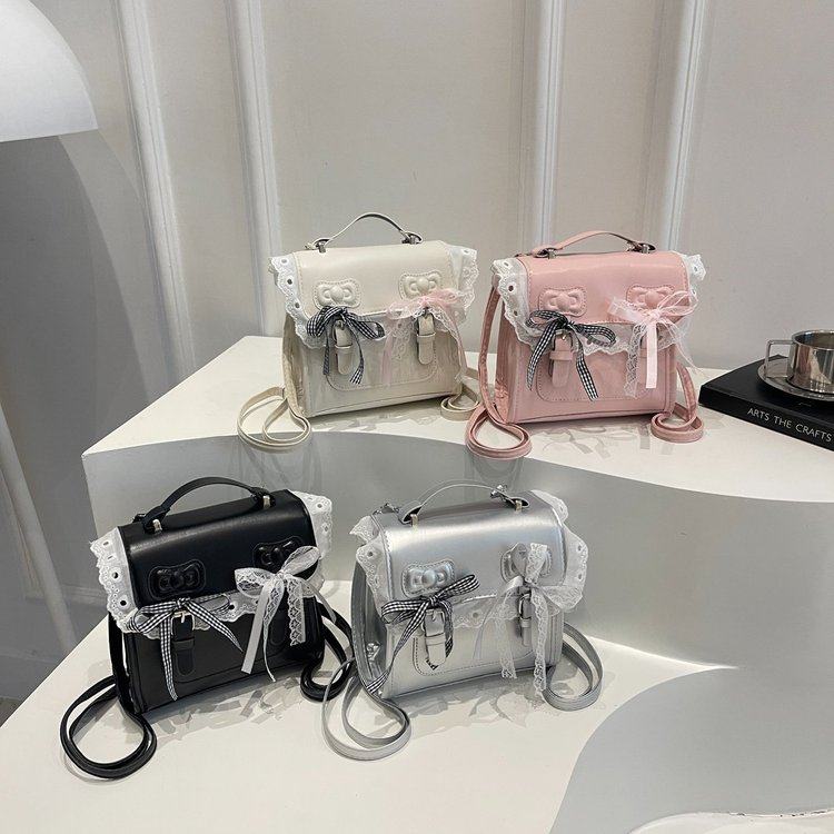 剑桥学院风双肩包女2025新款时尚蝴蝶结手提小书包秋季百搭后背包