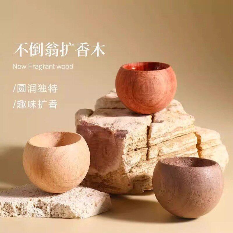 1不倒翁扩香木车载香薰扩香器精油花露水风油精室内圆形赶蚊挥发