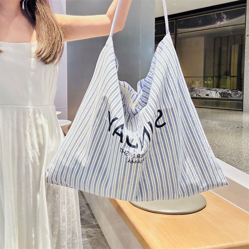 小众设计2024夏季新款简约印花条纹帆布包单肩斜跨包大容量托特包,箱包皮具/热销女包/男包,时尚帆布包,淘宝优惠券,粉丝福利购,淘宝优惠卷
