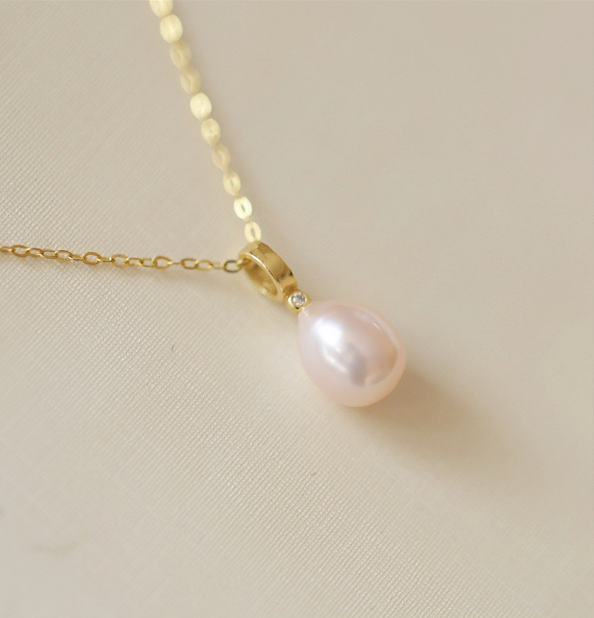 925纯银18k金瓜子扣水滴眼泪形淡水珍珠吊坠锁骨项链堪比akoya