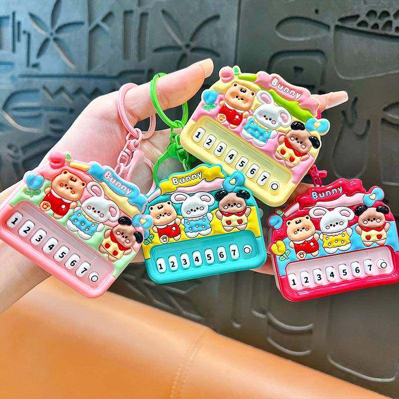 创意潮酷功能性小挂件钥匙扣可爱书包挂件汽车钥匙链抓娃娃机货源