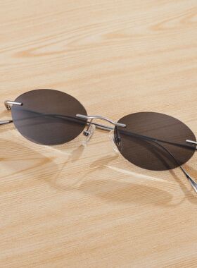 时尚纯钛偏光太阳眼镜旅行拍照防紫外线遮阳潮百搭无框小椭圆墨镜