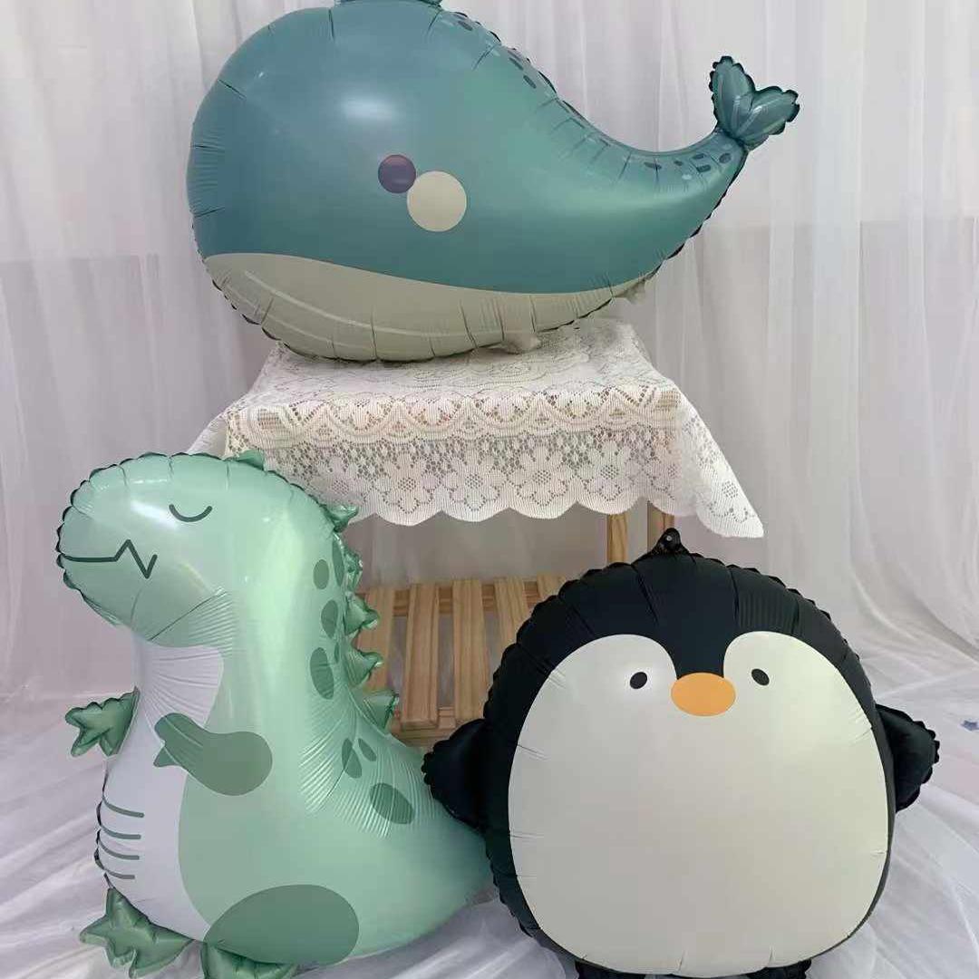 新款卡通主题恐龙企鹅鲸鱼铝膜气球儿童生日派对场景装饰拍照道具