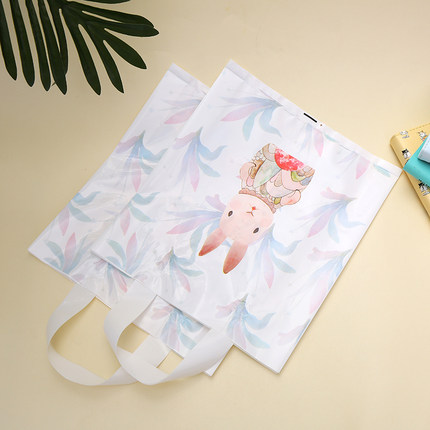 加厚卡通兔服装店袋侧宽手提打包袋化妆品购物袋男女童塑料袋定制