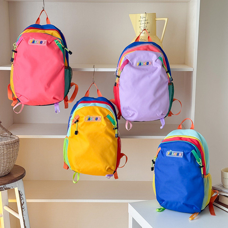 幼儿园小书包5岁儿童双肩包男女宝学生轻便户外旅行撞色拼接书包