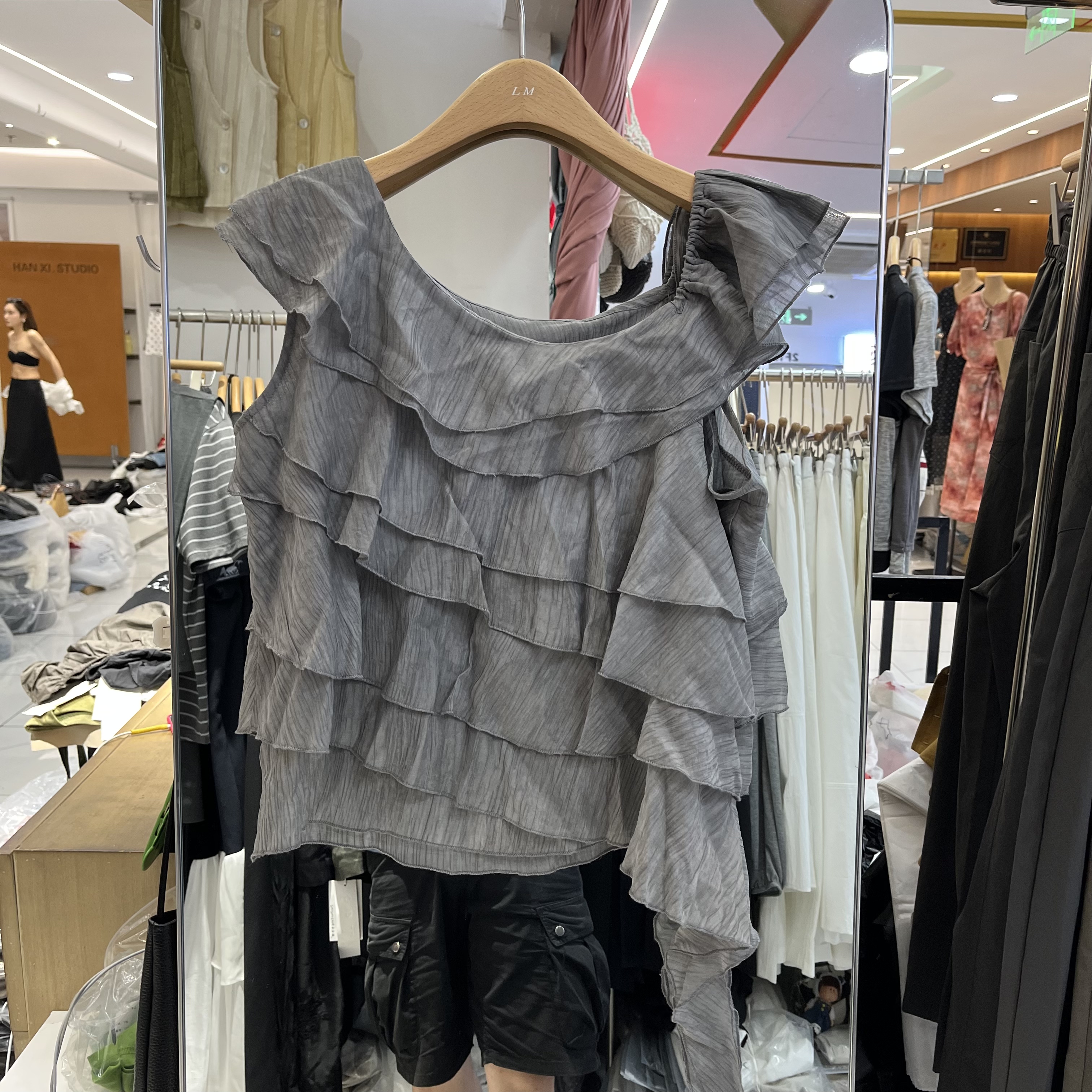 欧洲站2026夏季新款女士荷叶边斜领不规则下摆韩版无袖欧货小衫潮